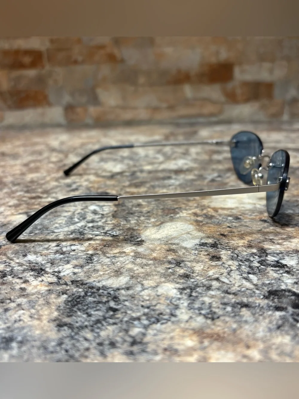 CHANEL 4003 C.103/72 Rimless Silver Blue Lens Titanium Frame Sunglasses